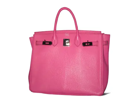 A pink Hermes Birkin with palladium hardware on a white background